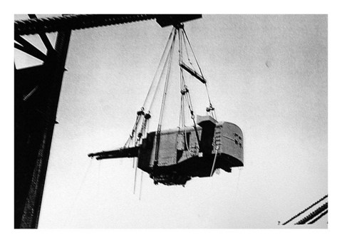 8-inch turret being removed from USS Lexington, 30 March 1942 — photo D