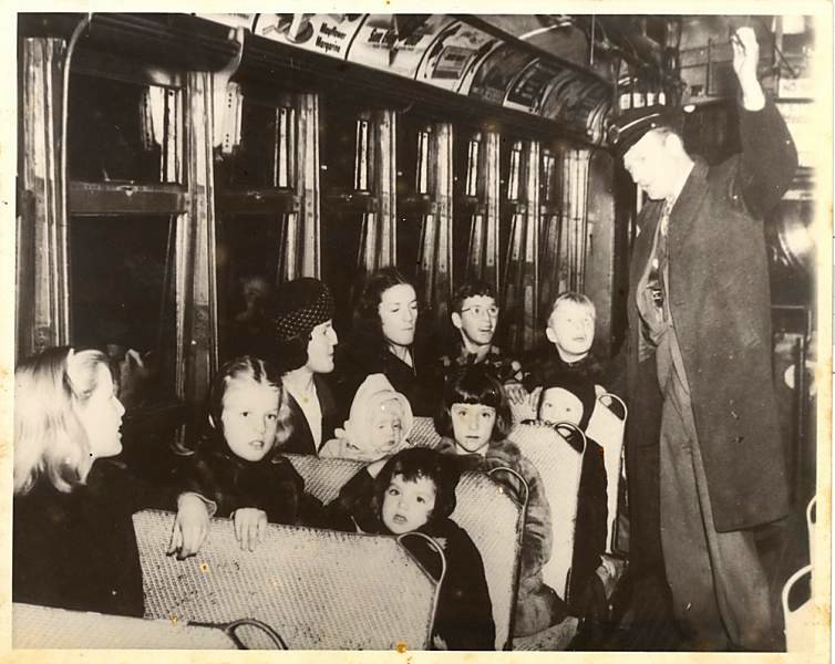 The Kilroy family in their trolley car
