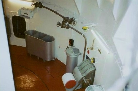 Tubs filled with water into which broken powder bags were dumped for safety.