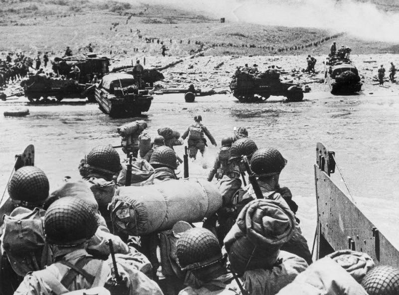 American soldiers and supplies arrive at Normandy