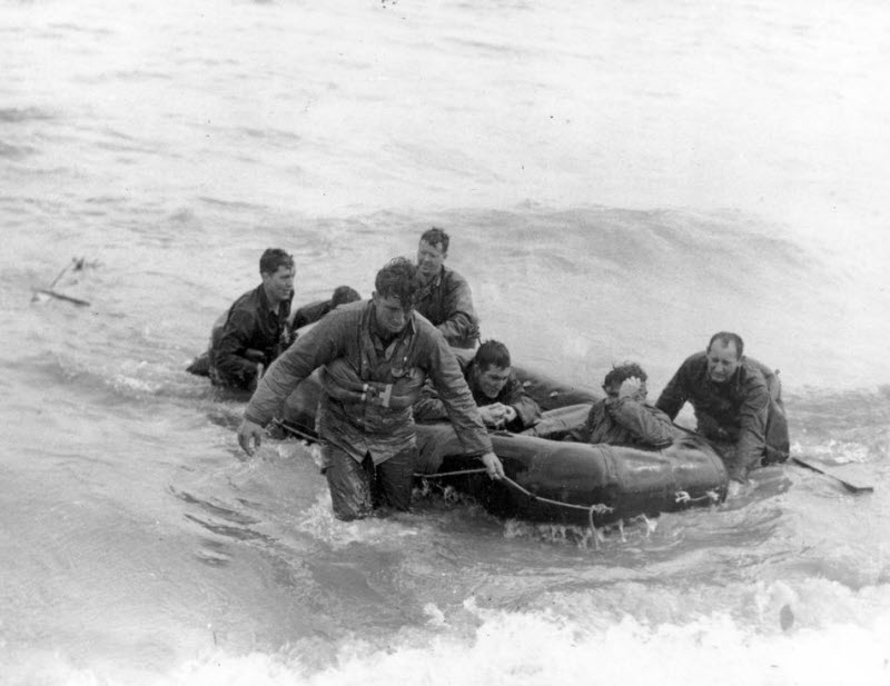 US doughboys brought ashore at Normandy June 13, 1944