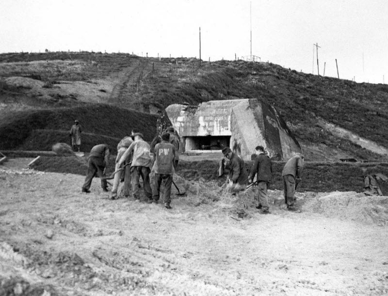 German prisoners landscape near Omaha Beach pill box