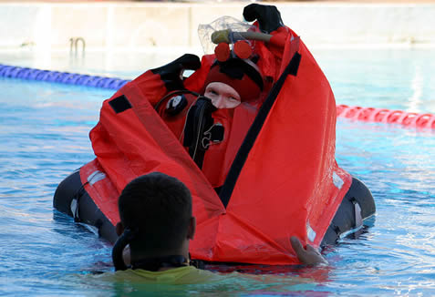 MK-10 SEIE suit surfaced with life raft deployed